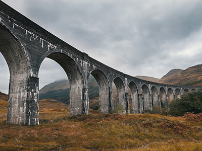 Glenfinnan Viaduct in Scotland, United Kingdom, one of the countries dominating in travel trends 2022, photo by barselona_dreams / Depositphotos.com