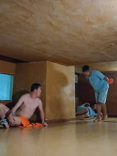 Men cruising in a low-ceiling sleeping area of Hamilton Hotel Sauna, a jjimjilbang popular among gay visitors, photo by Ivan Kralj