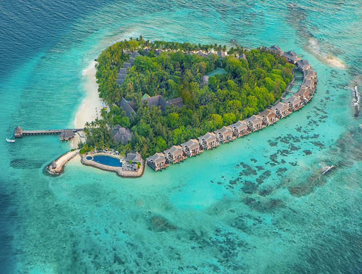 Aerial photo of Hembadhoo, heart island in the Maldives, with Taj Coral Reef Resort & Spa, courtesy of Taj Coral Reef Resort