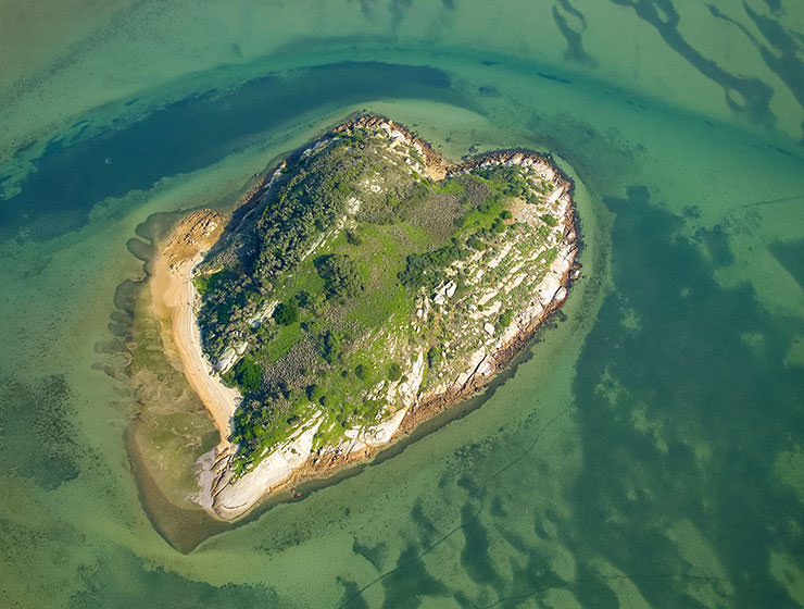 Aerial photo of Martins Island, heart-shaped island in Corner Inlet Marine & Coastal Park, Australia, photo by Mark Merton, Creative Commons