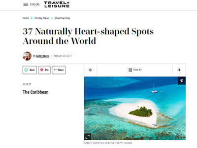 Screenshot from Travel+Leisure website showing the title "37 Naturally Heart-shaped Spots Around the World", illustrated by in reality non-existing heart island in the Caribbean