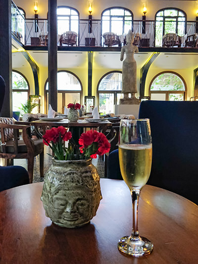 A glass of champagne served in Heritage Restaurant, a part of the Heritage Suites Hotel in Siem Reap, Cambodia, photo by Ivan Kralj