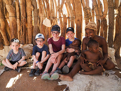 Edith Lemay's children meeting an African family, photo credit Edith Lemay