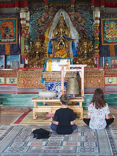 Edith Lemay's children in a Buddhist temple in Mongolia, photo by Edith Lemay