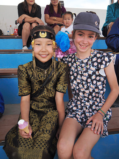 Mia Lemay, a Canadian girl posing next to a Mongolian friend, photo by Edith Lemay.