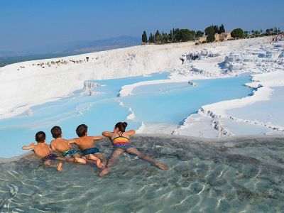 Edith Lemay's children bathing in a hot spring of Pamukkale in Turkey, on their world voyage before they lose eyesight, photo by Edith Lemay