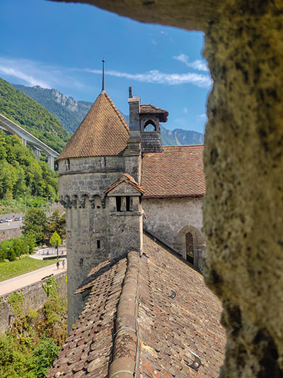 Chillon Castle, Switzerland, an important historic toll station, with modern highway in the background, photo by Ivan Kralj.