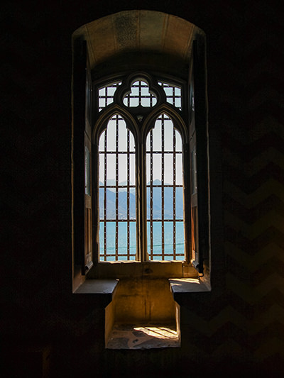 Window seats in Chillon Castle, with views of Lake Geneva and French Alps, photo by Ivan Kralj.