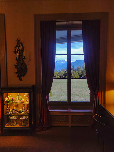 The view of the Alpine landscape through the window of Charlie Chaplin's manor in Vevey, Switzerland, photo by Ivan Kralj.