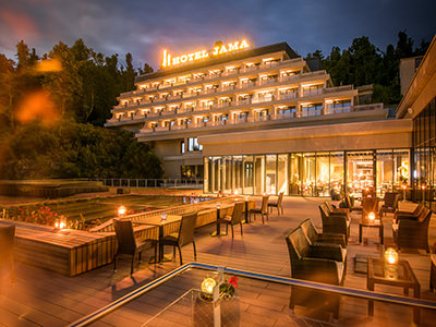 Exterior of Hotel Jama in Postojna, by night, copyright Postojna Cave Park Slovenia.