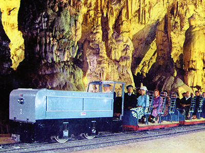 First electrical train in Postojna Cave in 1957, copyright Postojna Cave Park Slovenia.