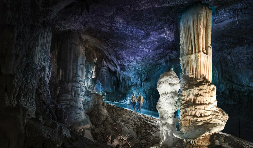 Visitors admiring Brilliant, the symbol stalagmite of Postojna Cave in Slovenia, copyright Postojna Cave Park Slovenia