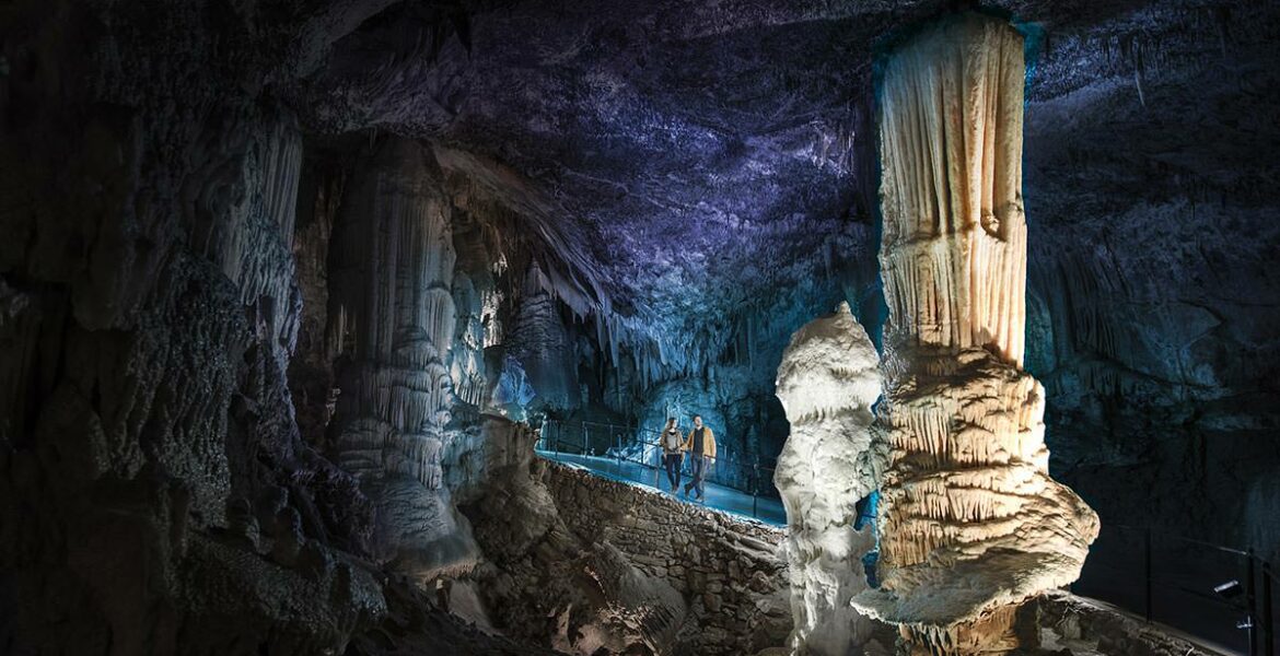 Visitors admiring Brilliant, the symbol stalagmite of Postojna Cave in Slovenia, copyright Postojna Cave Park Slovenia