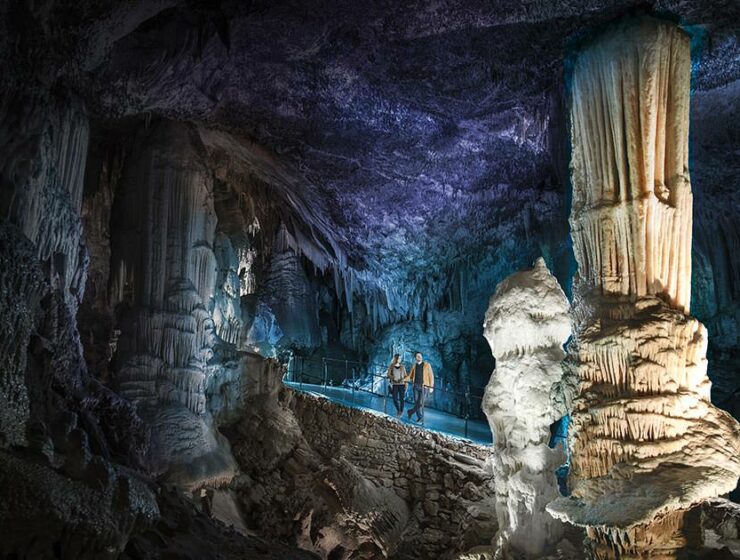 Visitors admiring Brilliant, the symbol stalagmite of Postojna Cave in Slovenia, copyright Postojna Cave Park Slovenia