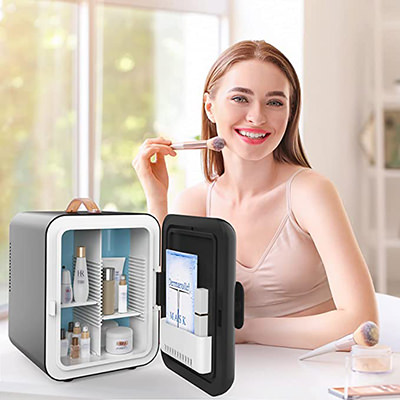 Young woman posing with a cosmetic brush next to a mini make-up fridge, by Aidek.
