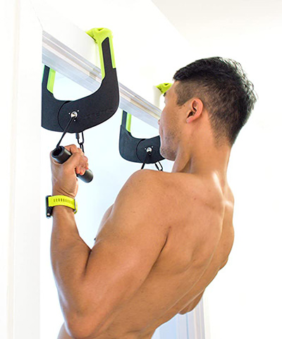 Man training on Eleviia, a portable pull-up bar that can be easily assembled at any doorframe, one of the most unique Valentine's Day gifts for travel lovers, by Duonamic.
