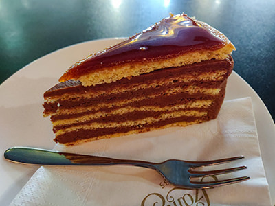 Dobos torte, one of the most known Hungarian desserts, made of sponge cake, chocolate buttercream and with a hard caramel top, as served in Szamos Cafe in Budapest, photo by Ivan Kralj.