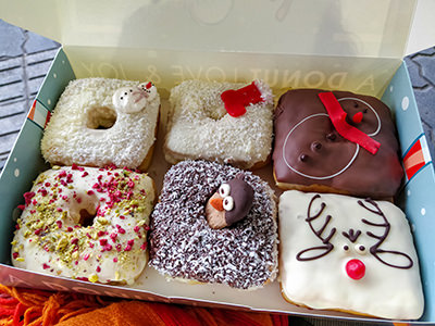 Christmas selection of six square-shaped donuts as produced by The Box Donut, one of the best desserts in Budapest, Hungary, photo by Ivan Kralj.