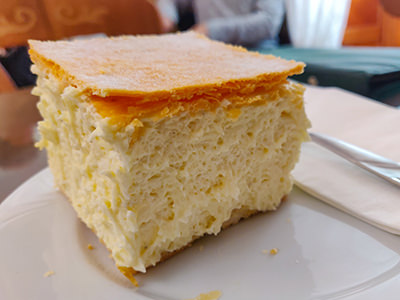 Kremes, the Hungarian version of cremeschnitte, the most popular dessert in Hungary, as served at Ruszwurm Cukraszda in Budapest, photo by Ivan Kralj.
