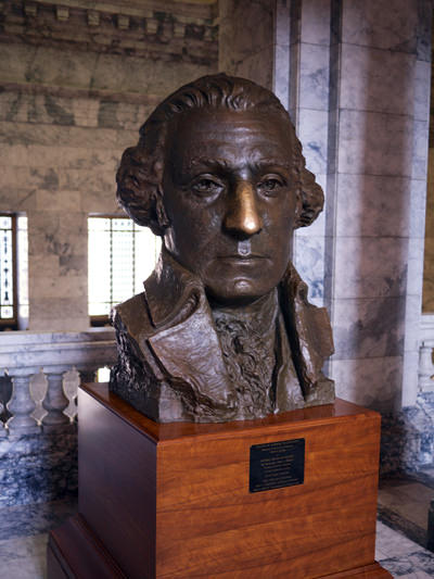 The bronze bust of George Washington whose nose has turned gold due to frequent good-luck rubbing; photo by Frank Fujimoto.