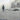 Man standing close to the seals in Antarctica, shot during the British Antarctic Expedition 1907-1909.