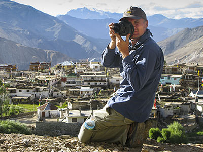 Slovenian photographer Matjaž Krivic in action behind the camera, taking photos in Tibet.