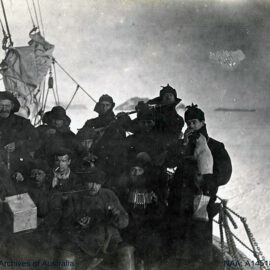 Men exploring Antarctica aboard a ship, posing with music instruments during the British Antarctic Expedition 1907-1909.
