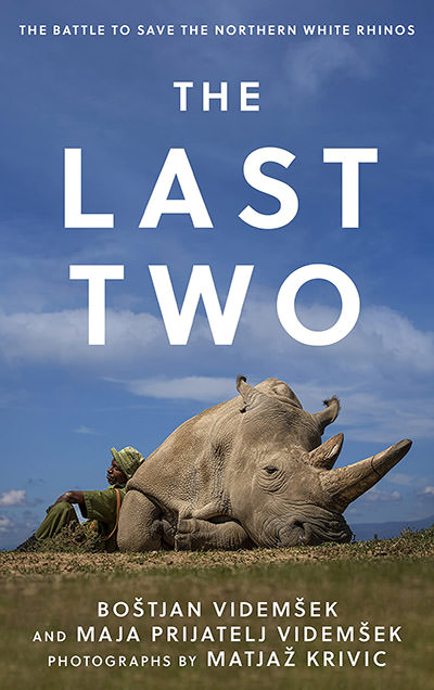 The cover of the book "The Last Two" by Boštjan Videmšek and Maja Prijatelj Videmšek, with photographs by Matjaž Krivič, about the last remaining northern white rhinos in the world and the fight to save the species.