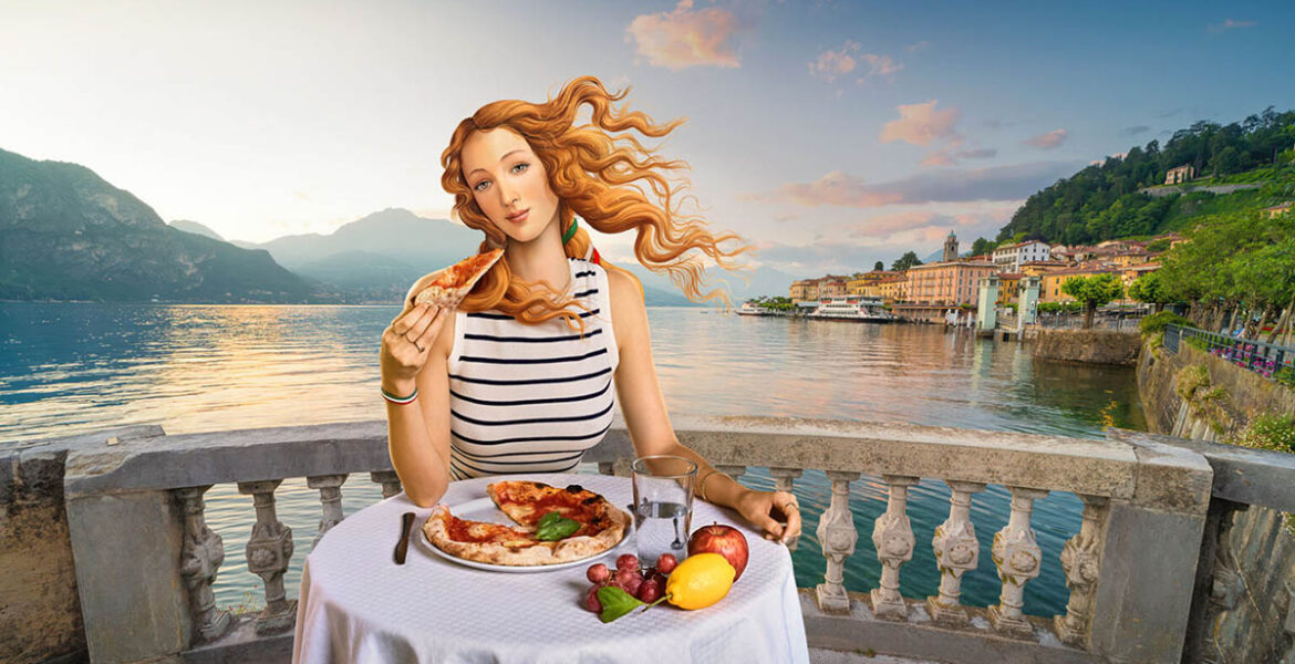 Botticelli's Venus shown eating pizza at Lake Como, as part of the 'Open to Meraviglia', controversial Italian tourism campaign.