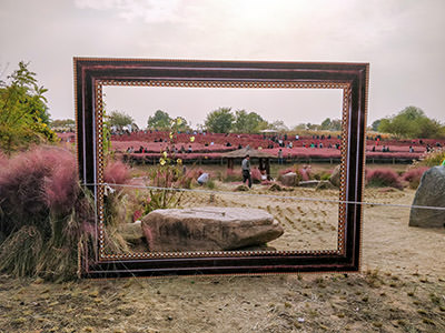 The giant picture frame standing in front of the Haneul Park vistas, the ecological park in Seoul, South Korea; photo by Ivan Kralj.