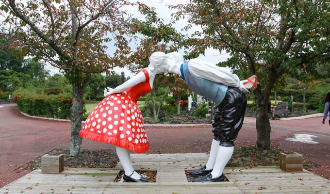 Sculpture of two lovers kissing while standing at distance, an exhibit at Jeju Loveland erotic theme park in Jeju Island, South Korea, photo by Ivan Kralj.