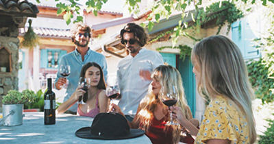 Screenshot from 'Open to Meraviglia', Italian tourism campaign that features young people drinking Slovenian wine in Slovenia.