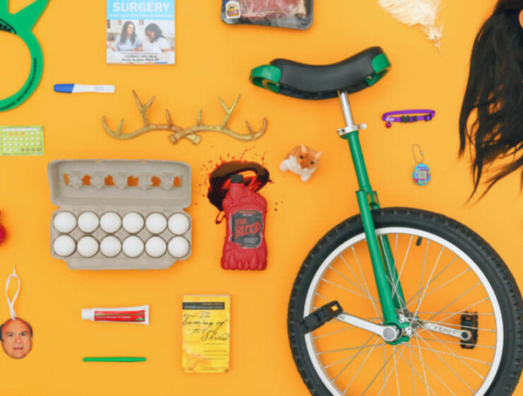 Display of a variety of items in Uber Lost and Found Index for 2023, from eggs and fake blood to unicycle and doll head.