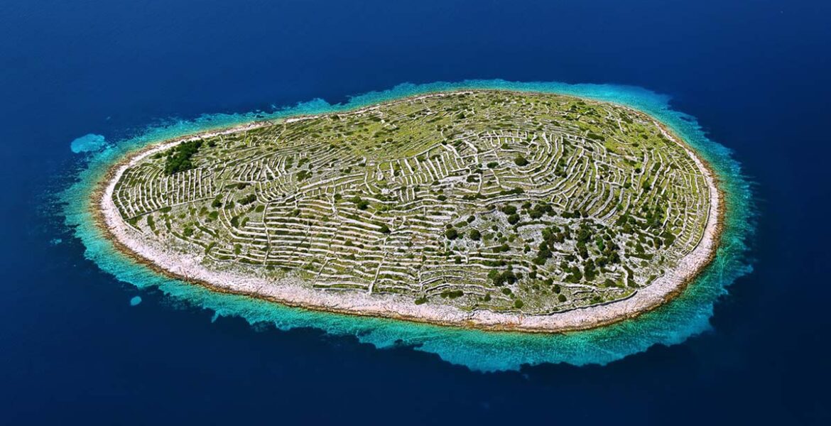 Croatian island Bavljenac, also known as Fingerprint Island, is just one of the many world islands that look like things; photo by Boris Kačan.