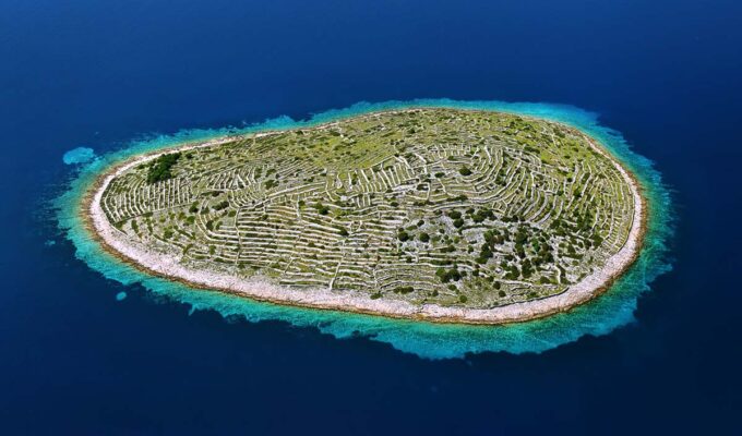 Croatian island Bavljenac, also known as Fingerprint Island, is just one of the many world islands that look like things; photo by Boris Kačan.