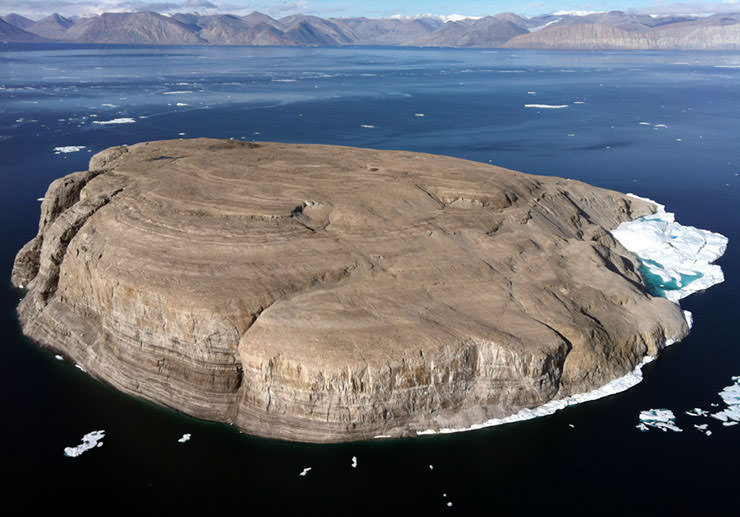Hans Island in Nares Strait of the Arctic, island that looks like an American-style pancake; photo by Toubletap.