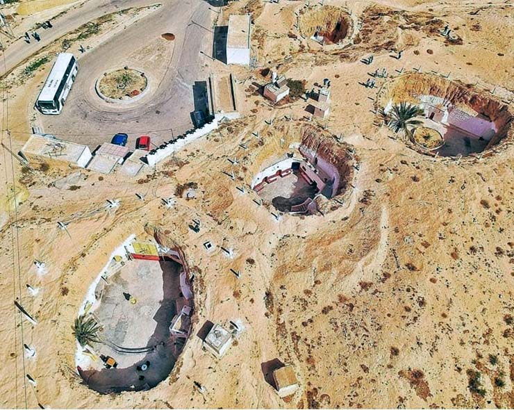 Aerial view of underground cave dwellings in Tunisia, Sidi Idriss Hotel, where Star Wars movies have been filmed; photo Booking.com