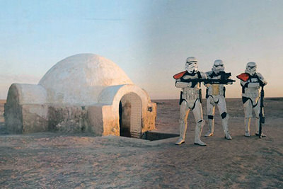 Men dressed as armed Stormtroopers at one of the filming sites of Star Wars during the movie-inspired tour in Tunisia; photo by Viator.com.