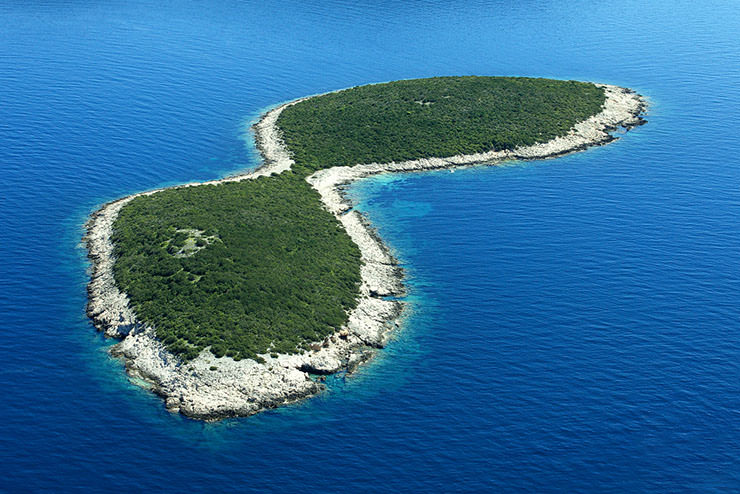 Aerial shot of Vodenjak, Croatian island that looks like a bikini top; photo by Boris Kačan.