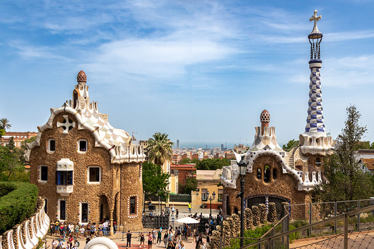 Whimsical architecture by Antoni Gaudí in Park Güell, in Barcelona, Spain, one of the best places to visit during one's first European trip; photo by Matthieu Rochette, Unsplash.