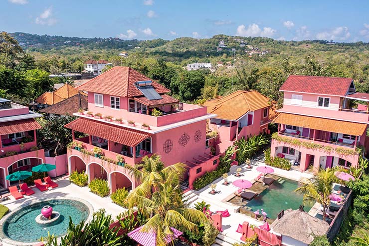 Aerial view of pink-colored hotel PinkCoco Uluwatu on Bali; photo by PinkCoco.