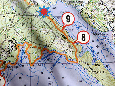 Part of the Premužić Trail map in Rab Geopark on Frkanj peninsula, with markations of stops of interest, passing over famous FKK Kandarola Beach where concessioner Josip Jurešić, Boja d.o.o., blocks passage to hikers that don't want to use the beach; photo by Ivan Kralj.