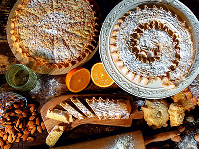 Top view of rapska torta display, traditional Rab cake made from almonds, citrus peels and cherry liqueur; photo by Vilma Slastice.
