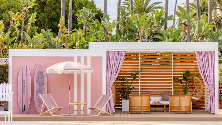 Pink pool cabana with pink surfboards and furniture at The Beverly Hills Hotel, Barbie-style hotel; photo by Beverly Hills Hotel.