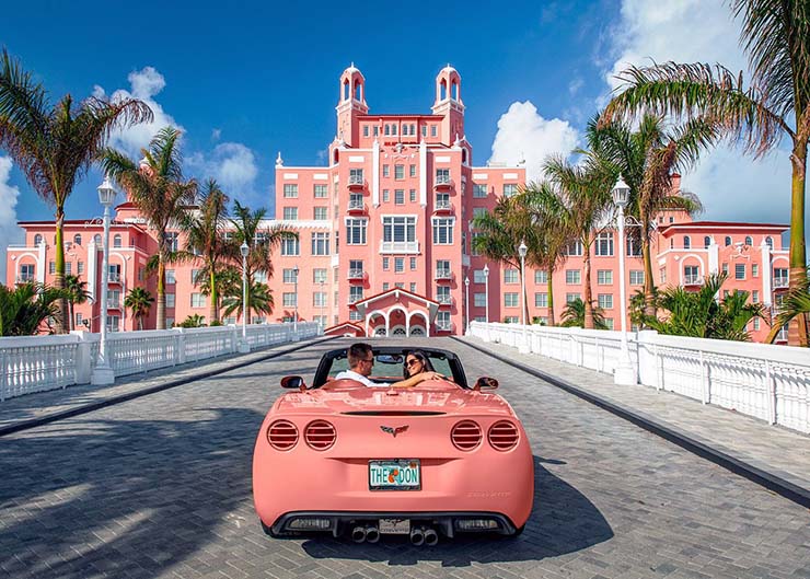 Pink car in front of the pink Don CeSar hotel in Florida; photo by The Don CeSar.