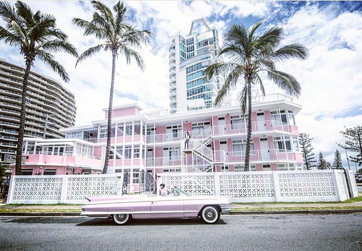 Vintage car parked in front of The Pink Hotel Coolangatta on Queenslands's Gold Coast, Australia; photo by The Pink Hotel.