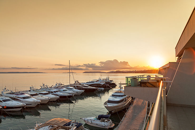 Marina with yachts in front of the Le Meridien Lav Split hotel, one of the best places to spend a luxury honeymoon in Croatia; photo by Le Meridien.