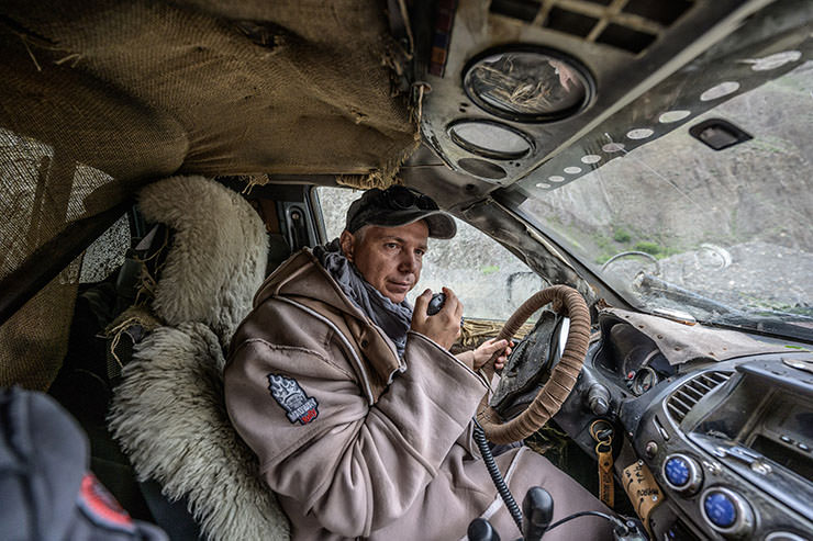 Alexey Gubarev behind the wheel of a car participating in MadWay Rally in Kyrgyzstan.