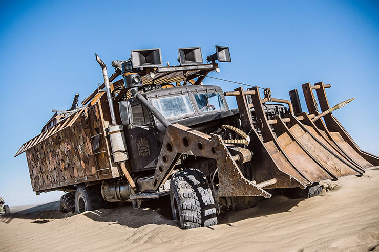 Heavily-modified truck in the fleet of MadWay Rally, Mad Max-inspired event in the sand dunes.