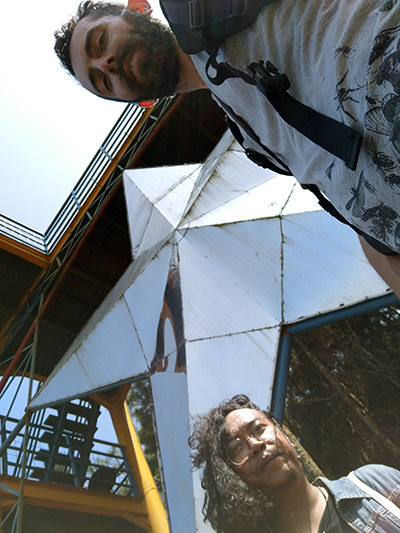 Fathin Naufal and Ivan Kralj posing in front of the Puncak Bintang mirror-star at Bukit Moko, above Bandung, Indonesia; photo by Ivan Kralj.